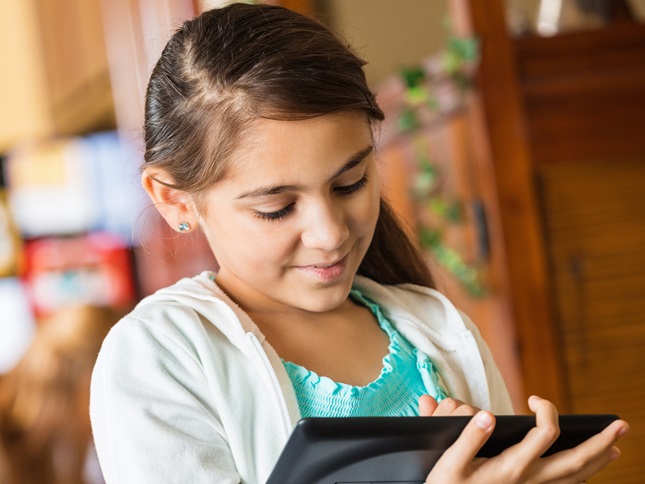 image of girl using tablet