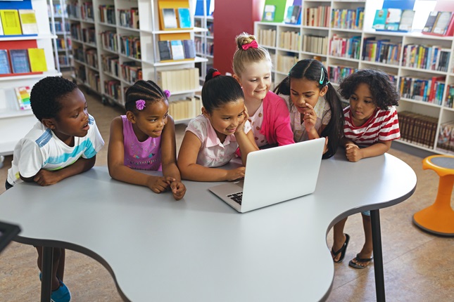 School children using a computer